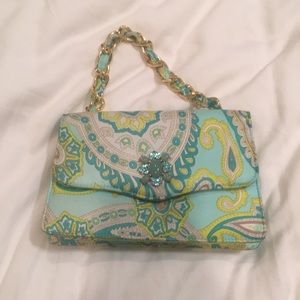Satin blue paisley bag with jewel on front flap